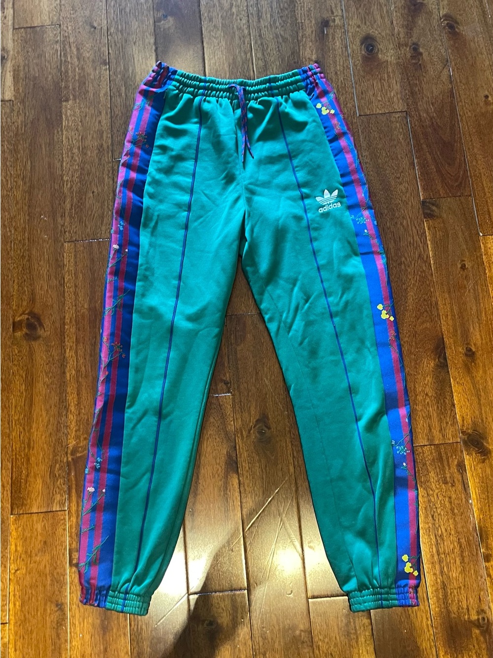 Adidas joggers with printed stripes